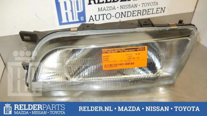 Headlight, left Nissan Almera