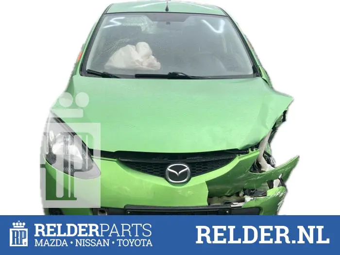 Rear seatbelt tensioner, left Mazda 2.