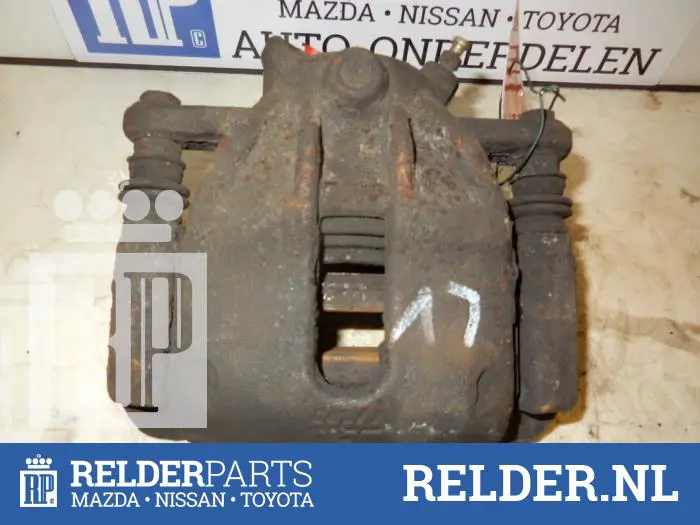 Front brake calliper, left Nissan Micra